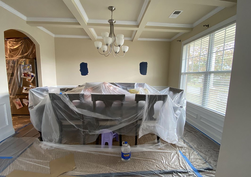 Furniture covered for Interior painting in progress